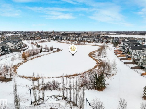 Snowy aerial view with a residential view - 1404 Podersky Link, Edmonton, AB - Outdoor With View