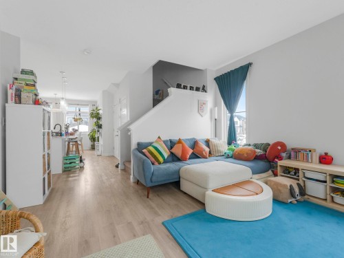 Living room with light wood-style floors - 1404 Podersky Link, Edmonton, AB - Indoor Photo Showing Living Room
