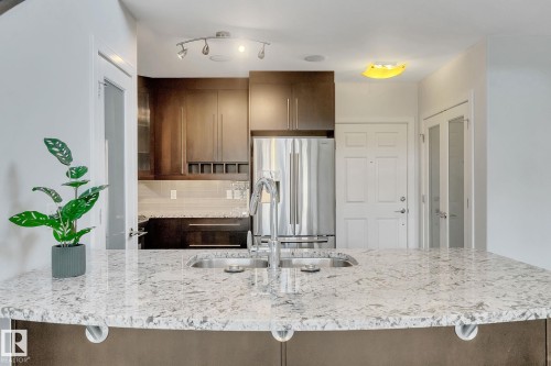 308 9603 98 Avenue, Edmonton, AB - Indoor Photo Showing Kitchen With Stainless Steel Kitchen With Double Sink With Upgraded Kitchen