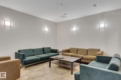 308 9603 98 Avenue, Edmonton, AB - Indoor Photo Showing Living Room