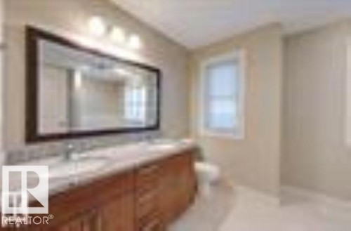 Full bathroom with vanity and walk in shower - 1621 Cunningham Way Sw, Edmonton, AB - Indoor