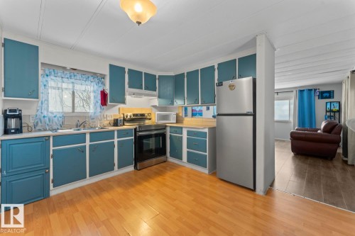#1 5612 53 Avenue, Cold Lake, AB - Indoor Photo Showing Kitchen With Double Sink