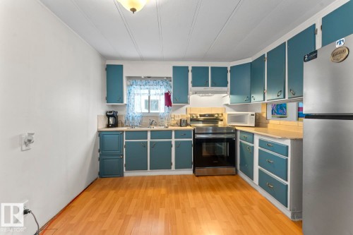 #1 5612 53 Avenue, Cold Lake, AB - Indoor Photo Showing Kitchen With Double Sink