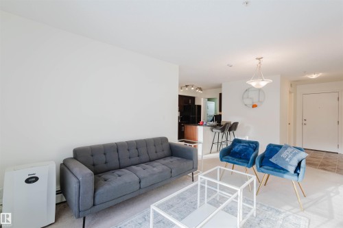 313 5816 Mullen Place, Edmonton, AB - Indoor Photo Showing Living Room