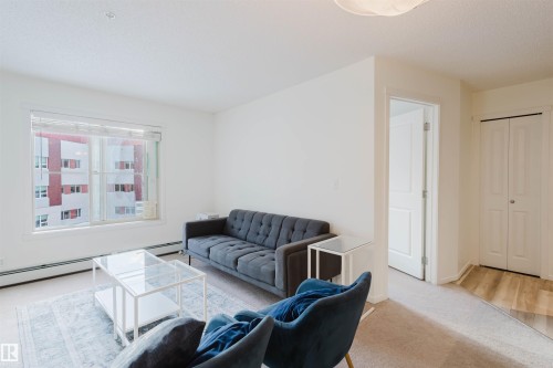 313 5816 Mullen Place, Edmonton, AB - Indoor Photo Showing Living Room