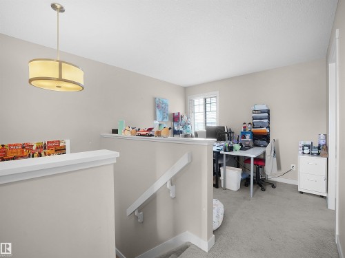 Home office with light carpet and baseboards - 1659 Hammond Crescent, Edmonton, AB - Indoor