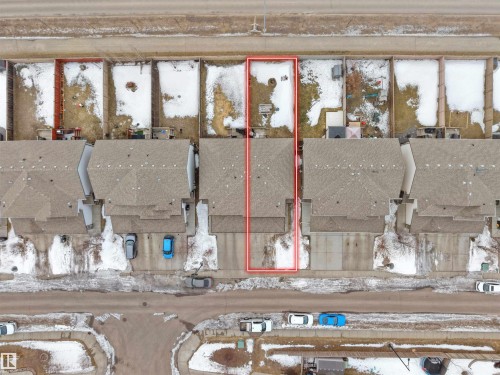 Snowy aerial view featuring property boundaries highlighted and a residential view - 1659 Hammond Crescent, Edmonton, AB - Indoor Photo Showing Other Room