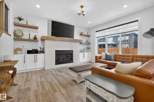 4470 Suzanna Crescent, Edmonton, AB - Indoor Photo Showing Living Room With Fireplace