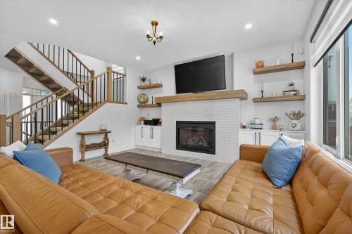 4470 Suzanna Crescent, Edmonton, AB - Indoor Photo Showing Living Room With Fireplace