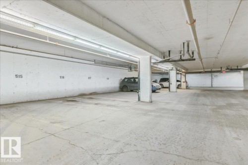 Garage with a parking deck - 112 5340 199 Street, Edmonton, AB - Indoor Photo Showing Garage