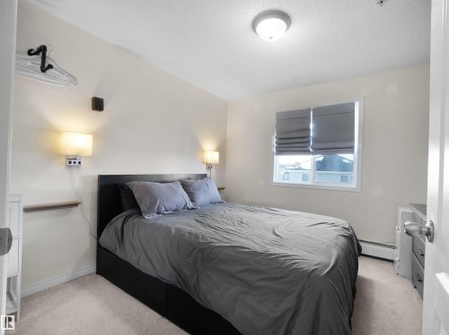 306 111 Edwards Drive, Edmonton, AB - Indoor Photo Showing Bedroom