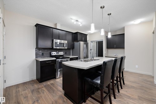 214 1004 Rosenthal Boulevard, Edmonton, AB - Indoor Photo Showing Kitchen With Double Sink With Upgraded Kitchen