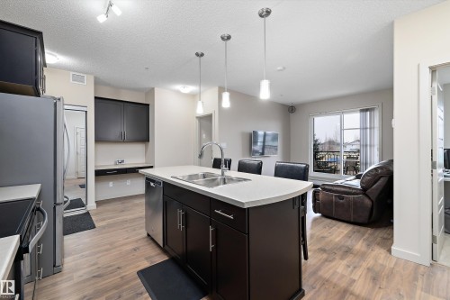 214 1004 Rosenthal Boulevard, Edmonton, AB - Indoor Photo Showing Kitchen With Double Sink