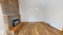3718 103B Street, Edmonton, AB  - Indoor With Fireplace 