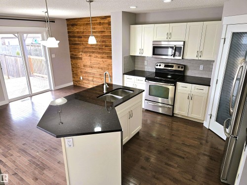 475 Reed Crescent, Leduc, AB - Indoor Photo Showing Kitchen With Stainless Steel Kitchen With Double Sink With Upgraded Kitchen