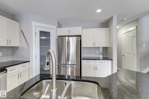 475 Reed Crescent, Leduc, AB - Indoor Photo Showing Kitchen With Stainless Steel Kitchen With Double Sink With Upgraded Kitchen