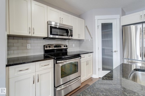 475 Reed Crescent, Leduc, AB - Indoor Photo Showing Kitchen With Stainless Steel Kitchen With Upgraded Kitchen