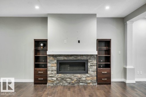 2228 22 Street, Edmonton, AB - Indoor Photo Showing Living Room With Fireplace
