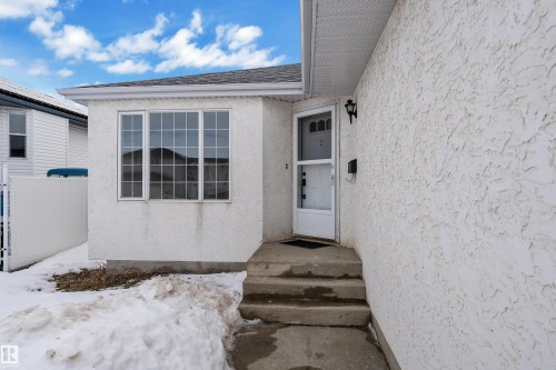 View of exterior entry featuring stucco siding - 6741 162A Avenue, Edmonton, AB - Outdoor With Exterior