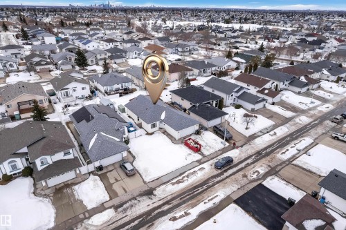 Snowy aerial view featuring a residential view - 6741 162A Avenue, Edmonton, AB - Outdoor With View