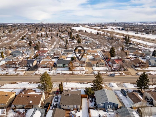 Snowy aerial view with a residential view - 9221 84 Street, Fort Saskatchewan, AB - Outdoor With View