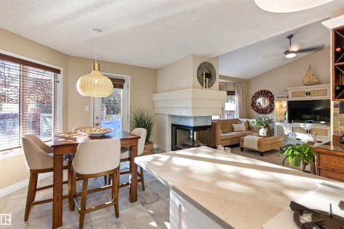 49 Berrymore Drive, St. Albert, AB - Indoor Photo Showing Dining Room With Fireplace