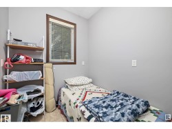 Bedroom featuring light tile patterned floors - 