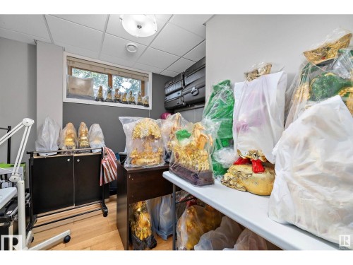 Kitchen featuring a drop ceiling and light wood finished floors - 9544 154 Street, Edmonton, AB 