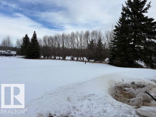 View of yard layered in snow - Rural Strathcona County, AB - Outdoor With View