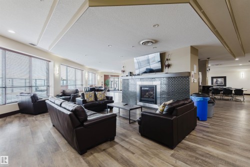 209 7909 71 Street, Edmonton, AB - Indoor Photo Showing Living Room With Fireplace