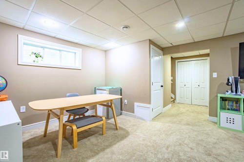 Office area featuring light colored carpet and a drop ceiling - 2224 Austin Way, Edmonton, AB - Indoor