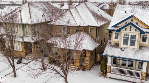 View of front facade featuring a deck and stone siding - 2224 Austin Way, Edmonton, AB - Outdoor
