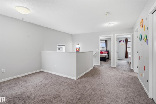 Spare room with carpet and baseboards - 5112 Andison Close, Edmonton, AB - Indoor Photo Showing Other Room