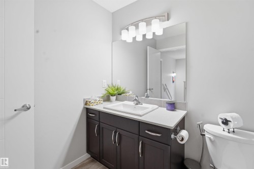 Bathroom featuring toilet and vanity - 5112 Andison Close, Edmonton, AB - Indoor Photo Showing Bathroom