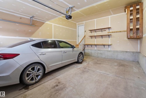 View of garage - 5112 Andison Close, Edmonton, AB - Indoor Photo Showing Garage