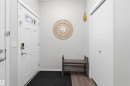 Entryway featuring dark wood-type flooring and baseboards - 5112 Andison Close, Edmonton, AB  - Indoor Photo Showing Other Room 