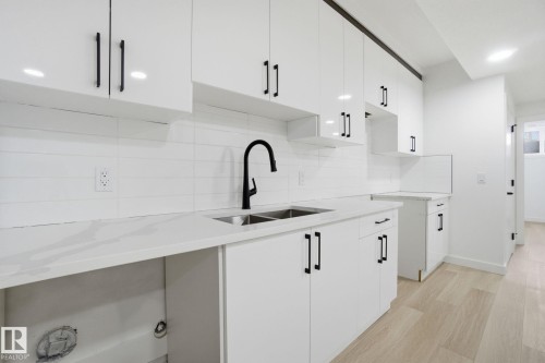 7605 92 Avenue, Edmonton, AB - Indoor Photo Showing Kitchen With Double Sink With Upgraded Kitchen
