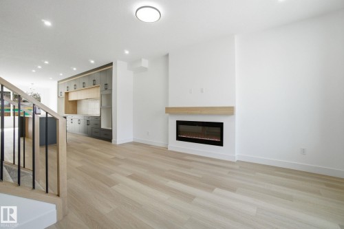 7605 92 Avenue, Edmonton, AB - Indoor Photo Showing Living Room With Fireplace