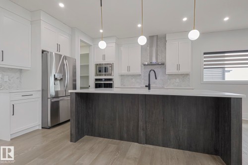 7446 Colonel Mewburn Road, Edmonton, AB - Indoor Photo Showing Kitchen With Stainless Steel Kitchen With Upgraded Kitchen