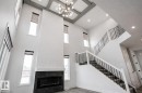 7446 Colonel Mewburn Road, Edmonton, AB  - Indoor Photo Showing Other Room With Fireplace 
