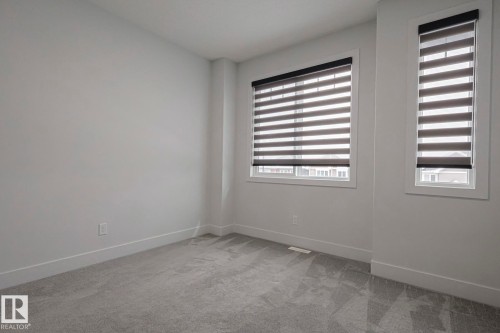 7446 Colonel Mewburn Road, Edmonton, AB - Indoor Photo Showing Other Room