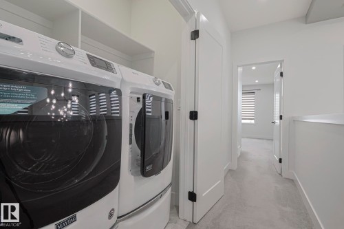 7446 Colonel Mewburn Road, Edmonton, AB - Indoor Photo Showing Laundry Room