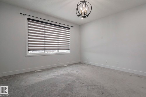 7446 Colonel Mewburn Road, Edmonton, AB - Indoor Photo Showing Other Room