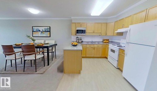 404 8315 83 Street, Edmonton, AB - Indoor Photo Showing Kitchen With Double Sink
