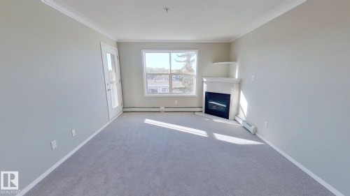 404 8315 83 Street, Edmonton, AB - Indoor With Fireplace