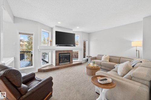 38 Embassy Place, St. Albert, AB - Indoor Photo Showing Living Room With Fireplace