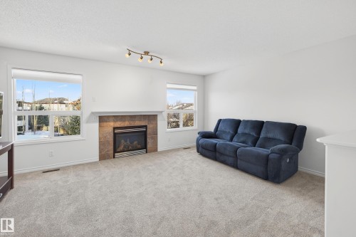 38 Embassy Place, St. Albert, AB - Indoor Photo Showing Living Room With Fireplace
