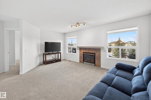 38 Embassy Place, St. Albert, AB - Indoor Photo Showing Living Room With Fireplace