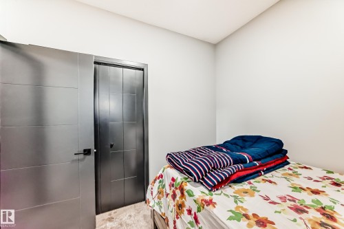 Bedroom featuring a closet - 5110 23A Avenue, Edmonton, AB - Indoor Photo Showing Bedroom