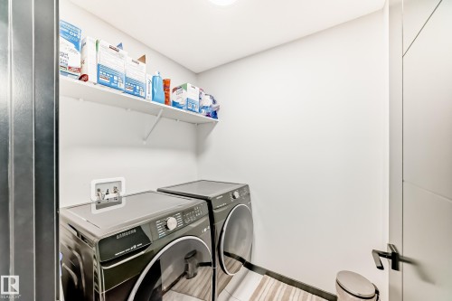 Laundry room featuring independent washer and dryer - 5110 23A Avenue, Edmonton, AB - Indoor Photo Showing Laundry Room